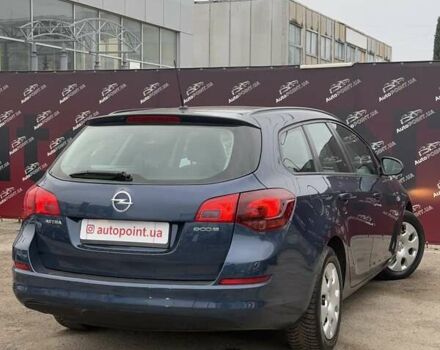 Синий Опель Астра, объемом двигателя 1.25 л и пробегом 214 тыс. км за 6500 $, фото 6 на Automoto.ua