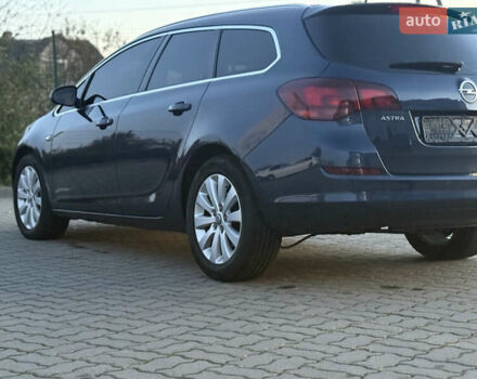 Синий Опель Астра, объемом двигателя 1.7 л и пробегом 171 тыс. км за 8700 $, фото 4 на Automoto.ua