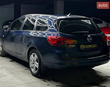 Синий Опель Астра, объемом двигателя 1.69 л и пробегом 231 тыс. км за 7500 $, фото 3 на Automoto.ua