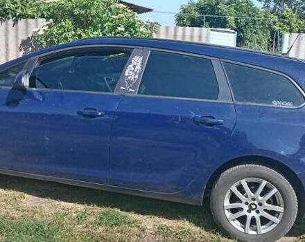 Синий Опель Астра, объемом двигателя 1.3 л и пробегом 248 тыс. км за 6600 $, фото 4 на Automoto.ua