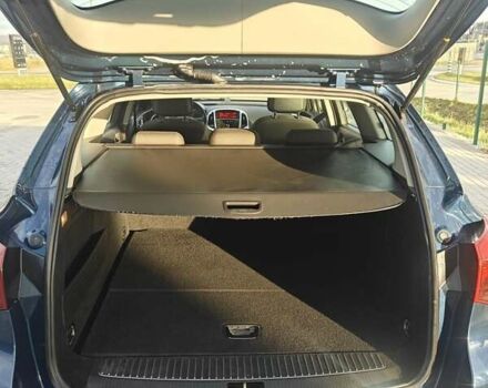 Синий Опель Астра, объемом двигателя 2 л и пробегом 280 тыс. км за 7300 $, фото 8 на Automoto.ua