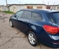 Синий Опель Астра, объемом двигателя 1.4 л и пробегом 260 тыс. км за 5500 $, фото 2 на Automoto.ua
