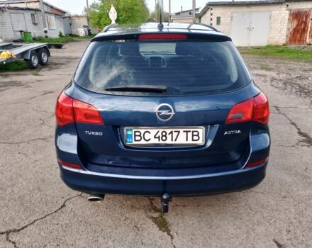 Синий Опель Астра, объемом двигателя 1.4 л и пробегом 260 тыс. км за 5500 $, фото 5 на Automoto.ua