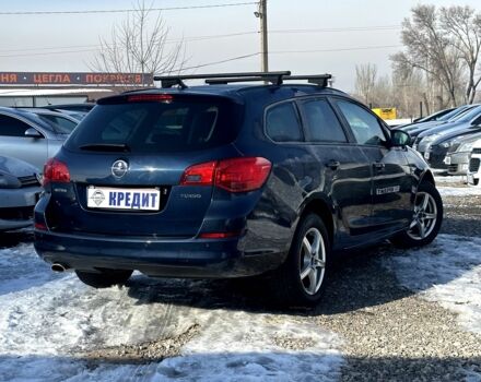 Синій Опель Астра, об'ємом двигуна 1.4 л та пробігом 206 тис. км за 7900 $, фото 1 на Automoto.ua