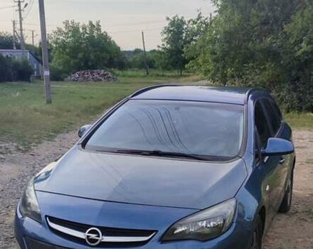 Синий Опель Астра, объемом двигателя 1.3 л и пробегом 265 тыс. км за 6000 $, фото 1 на Automoto.ua