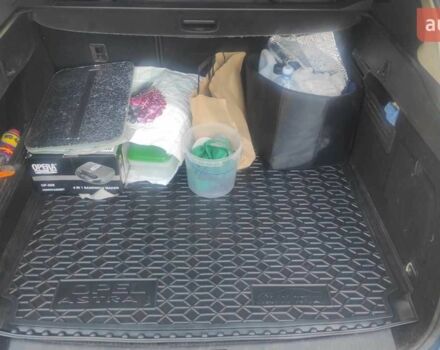 Синий Опель Астра, объемом двигателя 1.7 л и пробегом 289 тыс. км за 7399 $, фото 2 на Automoto.ua