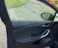 Синій Опель Астра, об'ємом двигуна 1.5 л та пробігом 157 тис. км за 12800 $, фото 25 на Automoto.ua