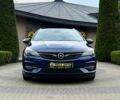 Синій Опель Астра, об'ємом двигуна 1.5 л та пробігом 180 тис. км за 14039 $, фото 1 на Automoto.ua