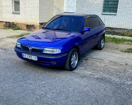 Синій Опель Астра, об'ємом двигуна 2 л та пробігом 400 тис. км за 2350 $, фото 1 на Automoto.ua