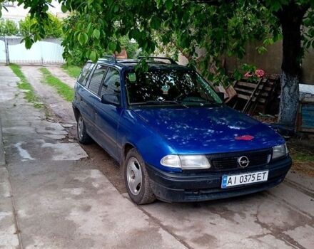 Синий Опель Астра, объемом двигателя 1.8 л и пробегом 350 тыс. км за 650 $, фото 1 на Automoto.ua
