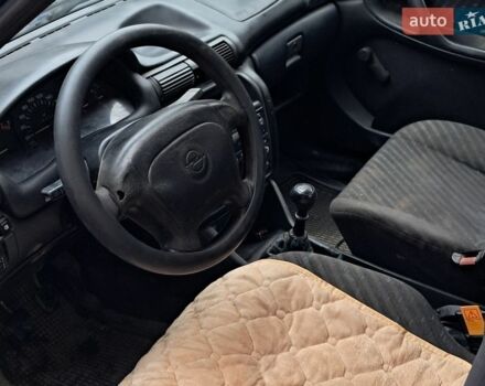 Синий Опель Астра, объемом двигателя 1.4 л и пробегом 200 тыс. км за 1100 $, фото 1 на Automoto.ua