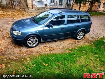 Синий Опель Астра, объемом двигателя 2 л и пробегом 450 тыс. км за 2500 $, фото 1 на Automoto.ua