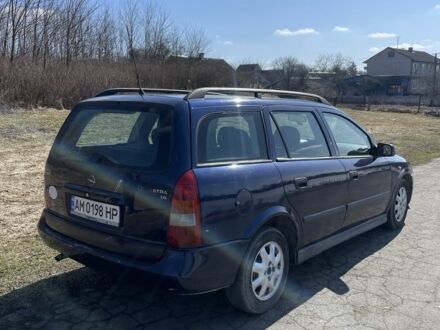 Синий Опель Астра, объемом двигателя 1.6 л и пробегом 320 тыс. км за 2200 $, фото 1 на Automoto.ua