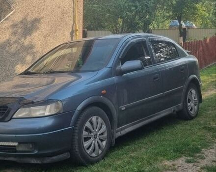 Синий Опель Астра, объемом двигателя 2 л и пробегом 300 тыс. км за 2200 $, фото 1 на Automoto.ua