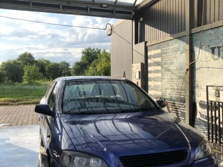 Синий Опель Астра, объемом двигателя 1.6 л и пробегом 384 тыс. км за 1500 $, фото 1 на Automoto.ua