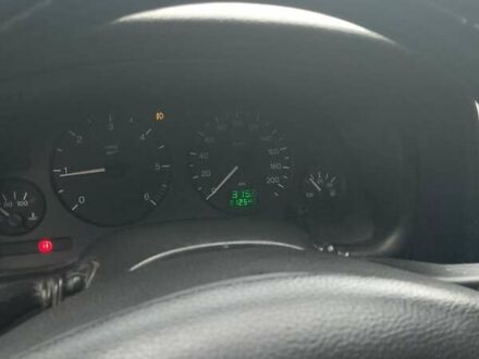 Синий Опель Астра, объемом двигателя 2 л и пробегом 312 тыс. км за 2700 $, фото 1 на Automoto.ua