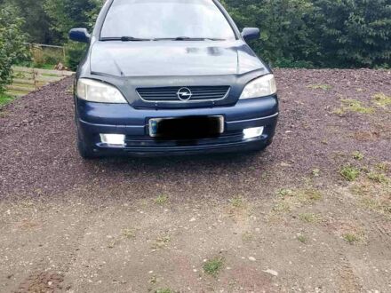 Синий Опель Астра, объемом двигателя 2 л и пробегом 312 тыс. км за 2700 $, фото 1 на Automoto.ua