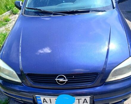 Синий Опель Астра, объемом двигателя 2 л и пробегом 190 тыс. км за 3300 $, фото 1 на Automoto.ua