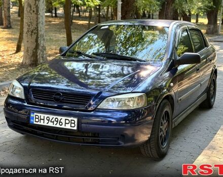 Синий Опель Астра, объемом двигателя 2 л и пробегом 148 тыс. км за 2550 $, фото 1 на Automoto.ua