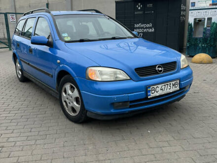 Синий Опель Астра, объемом двигателя 2 л и пробегом 316 тыс. км за 1499 $, фото 1 на Automoto.ua