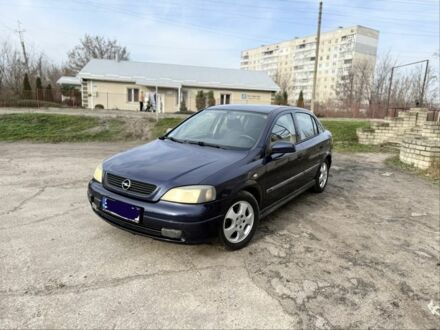Синій Опель Астра, об'ємом двигуна 2 л та пробігом 195 тис. км за 1900 $, фото 1 на Automoto.ua