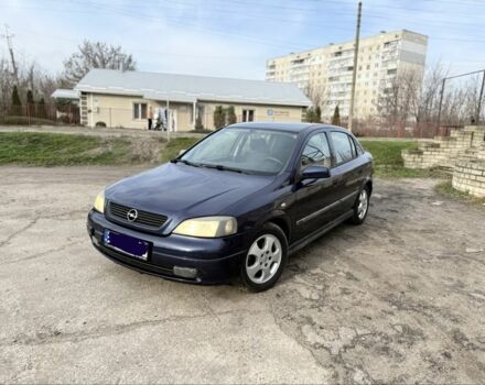 Синий Опель Астра, объемом двигателя 2 л и пробегом 195 тыс. км за 1900 $, фото 1 на Automoto.ua
