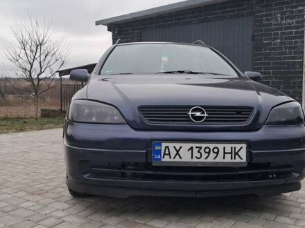 Синий Опель Астра, объемом двигателя 1.6 л и пробегом 330 тыс. км за 1950 $, фото 1 на Automoto.ua