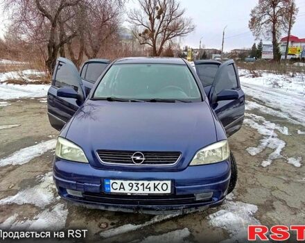 Синий Опель Астра, объемом двигателя 2 л и пробегом 220 тыс. км за 3250 $, фото 1 на Automoto.ua