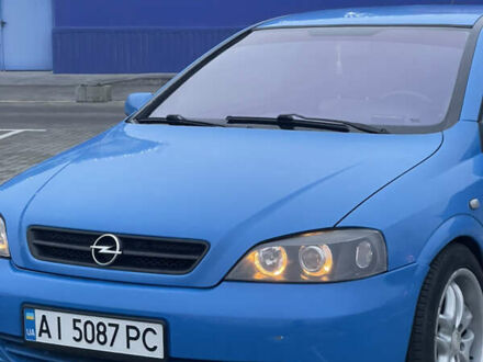 Синий Опель Астра, объемом двигателя 1.8 л и пробегом 320 тыс. км за 3400 $, фото 1 на Automoto.ua