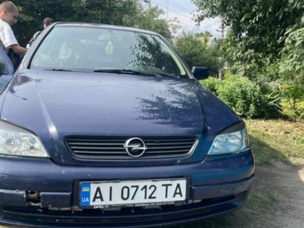 Синий Опель Астра, объемом двигателя 1.2 л и пробегом 451 тыс. км за 1000 $, фото 1 на Automoto.ua