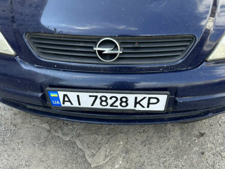 Синий Опель Астра, объемом двигателя 1.6 л и пробегом 370 тыс. км за 800 $, фото 1 на Automoto.ua