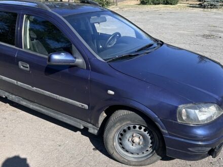 Синий Опель Астра, объемом двигателя 2 л и пробегом 350 тыс. км за 1302 $, фото 1 на Automoto.ua