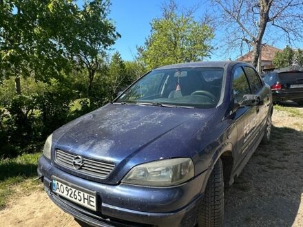 Синий Опель Астра, объемом двигателя 2 л и пробегом 392 тыс. км за 2400 $, фото 1 на Automoto.ua