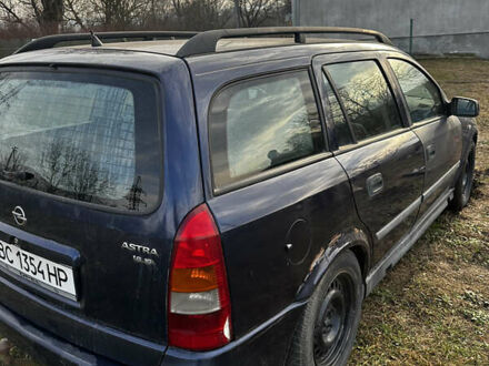 Синий Опель Астра, объемом двигателя 2 л и пробегом 300 тыс. км за 1650 $, фото 1 на Automoto.ua