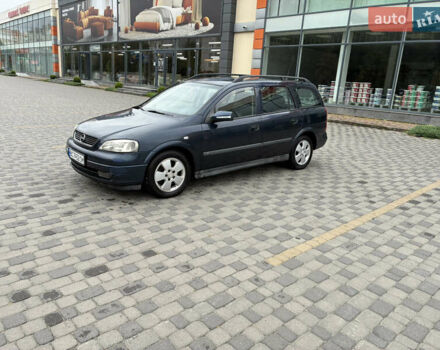 Синий Опель Астра, объемом двигателя 2 л и пробегом 318 тыс. км за 3450 $, фото 1 на Automoto.ua