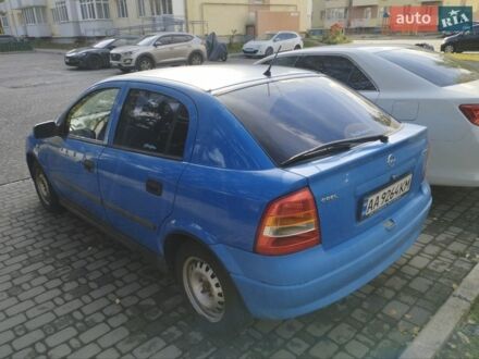 Синий Опель Астра, объемом двигателя 1.2 л и пробегом 303 тыс. км за 2500 $, фото 1 на Automoto.ua