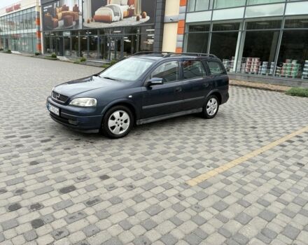 Синий Опель Астра, объемом двигателя 2 л и пробегом 318 тыс. км за 3450 $, фото 1 на Automoto.ua