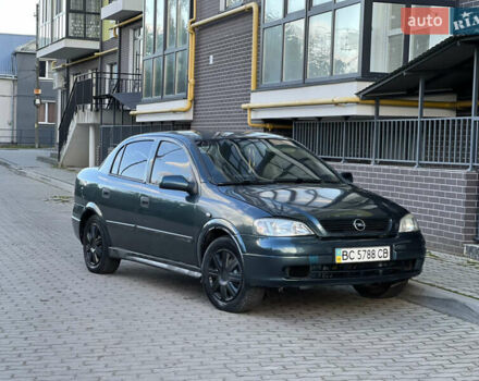 Синий Опель Астра, объемом двигателя 1.39 л и пробегом 299 тыс. км за 1799 $, фото 1 на Automoto.ua