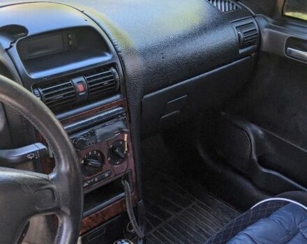 Синий Опель Астра, объемом двигателя 2 л и пробегом 300 тыс. км за 1009 $, фото 1 на Automoto.ua