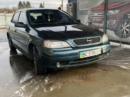 Синий Опель Астра, объемом двигателя 1.39 л и пробегом 243 тыс. км за 2500 $, фото 1 на Automoto.ua