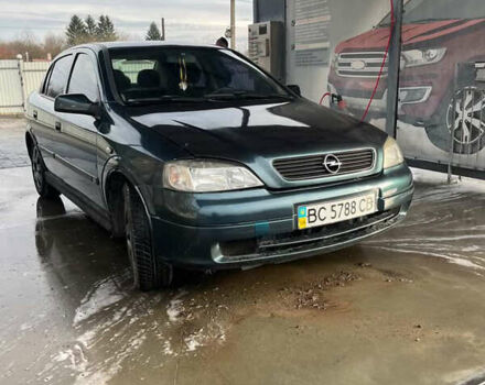 Синий Опель Астра, объемом двигателя 1.39 л и пробегом 243 тыс. км за 2500 $, фото 1 на Automoto.ua