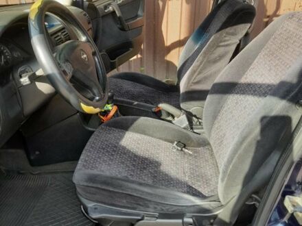 Синий Опель Астра, объемом двигателя 2 л и пробегом 293 тыс. км за 2700 $, фото 1 на Automoto.ua