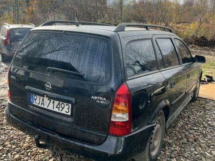 Синий Опель Астра, объемом двигателя 2 л и пробегом 260 тыс. км за 850 $, фото 1 на Automoto.ua