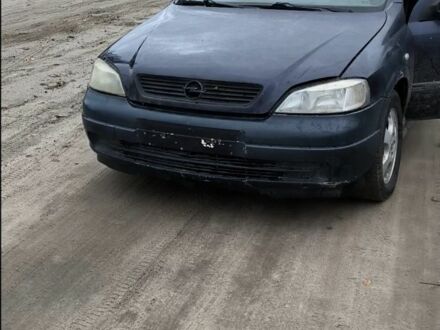 Синий Опель Астра, объемом двигателя 2 л и пробегом 300 тыс. км за 870 $, фото 1 на Automoto.ua