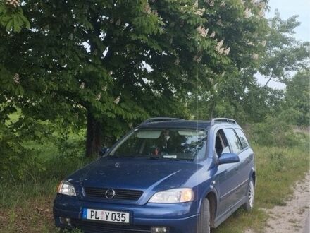 Синий Опель Астра, объемом двигателя 1.2 л и пробегом 200 тыс. км за 1500 $, фото 1 на Automoto.ua