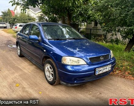 Синий Опель Астра, объемом двигателя 1.2 л и пробегом 218 тыс. км за 3180 $, фото 1 на Automoto.ua