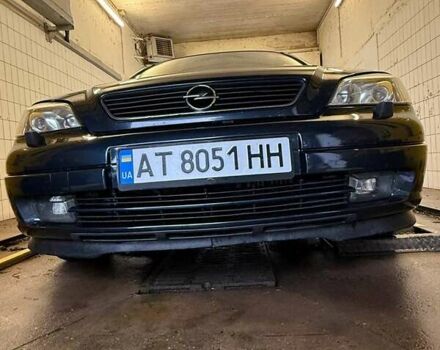 Синий Опель Астра, объемом двигателя 2 л и пробегом 230 тыс. км за 4731 $, фото 1 на Automoto.ua