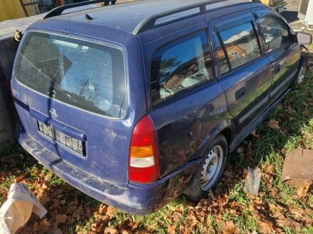 Синий Опель Астра, объемом двигателя 1.7 л и пробегом 220 тыс. км за 500 $, фото 1 на Automoto.ua