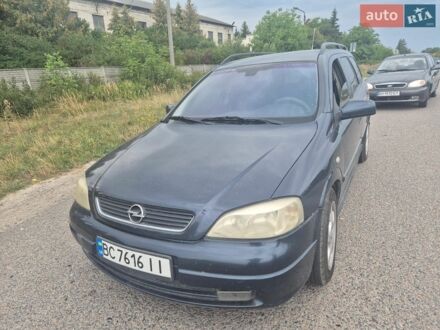 Синій Опель Астра, об'ємом двигуна 2 л та пробігом 300 тис. км за 1599 $, фото 1 на Automoto.ua