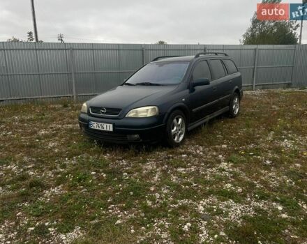 Синій Опель Астра, об'ємом двигуна 2 л та пробігом 300 тис. км за 1900 $, фото 1 на Automoto.ua
